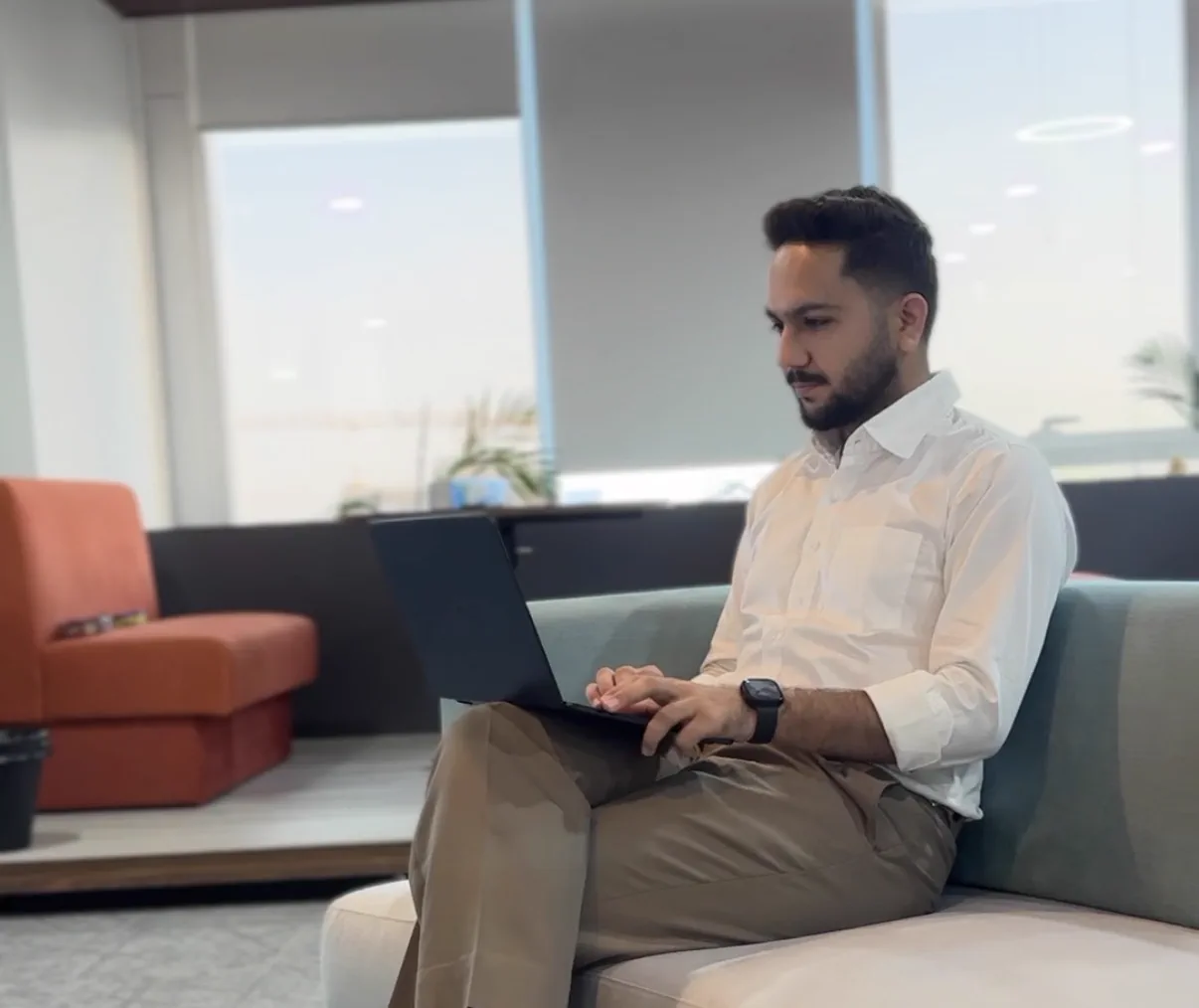 Keyur Thakkar working on a laptop